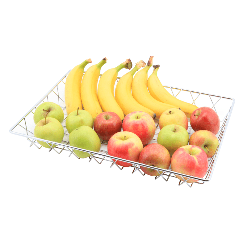 Apples and bananas displayed in a chrome wire display basket