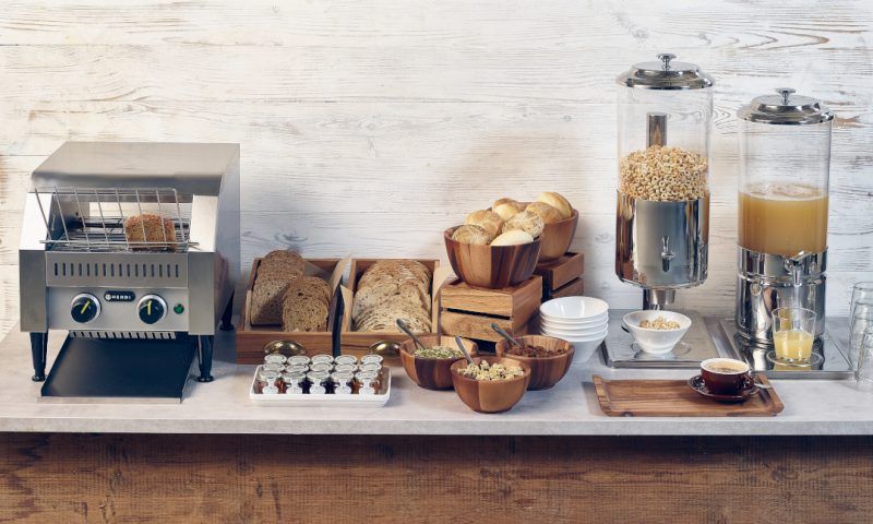 Buffet set up in a hotel with juice dispensers