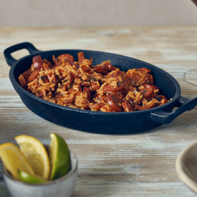 Close up of Cast Iron Eared Oval Serving Dish with tasty food