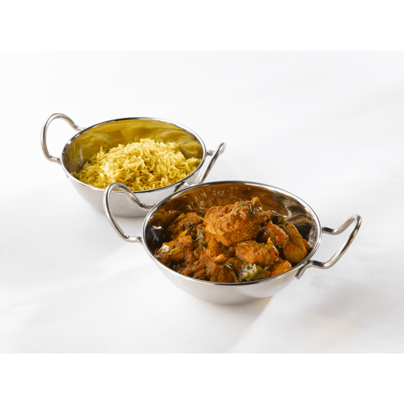 Curry and rice served in stainless steel balti dishes