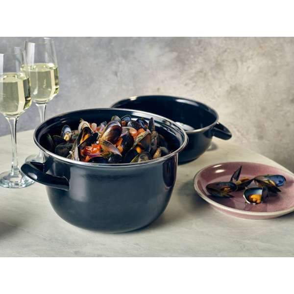 Lifestyle image of mussel pot with Rose Terra Coupr Plate