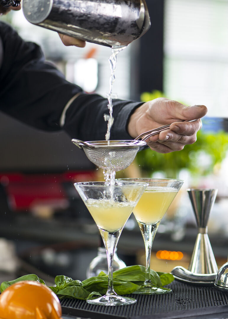 Making cocktails using V Line Martini Glasses