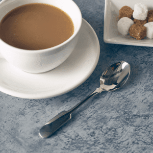 Old English Teaspoon Lifestyle Image with cup of tea