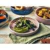Terra Porcelain Rose Presentation Plate with cooked peppers