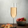 Vintage Champagne Flute filled with Champagne Lifestyle Image