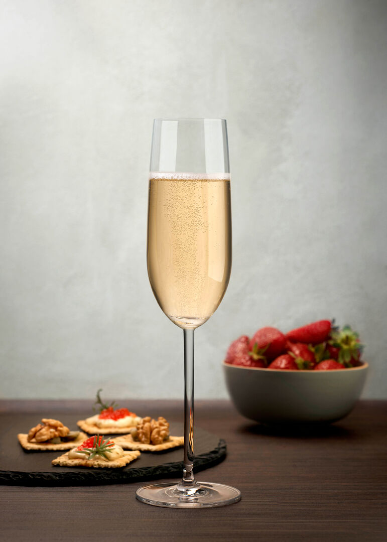 Vintage Champagne Flute filled with Champagne Lifestyle Image