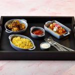 Black Butler Trays with Indian food.