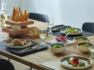 Nara Grey Bowls and Plates at a table lifestyle image