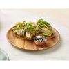 Copper Plared Mini Hammered Bowl on a platter with food