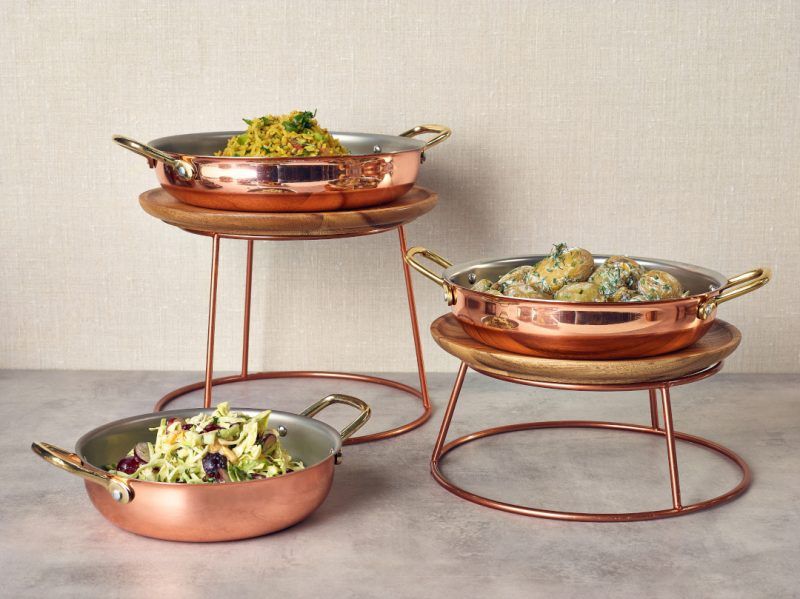 Copper buffet risers with copper plated buffet bowls