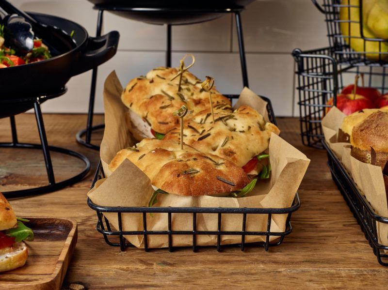 Delicious breads displayed in a Black Wire Display basket