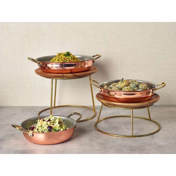 Lifestyle image of buffet risers and copper serving dishes