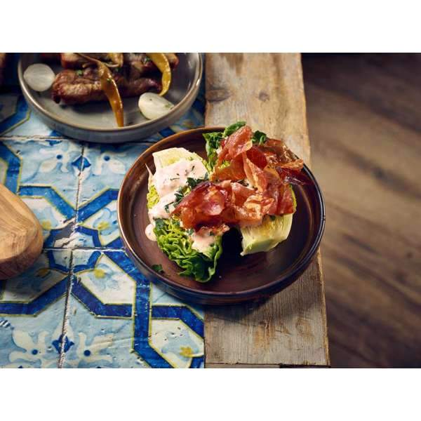 Rustic Copper Low Presentation Plate filled with food