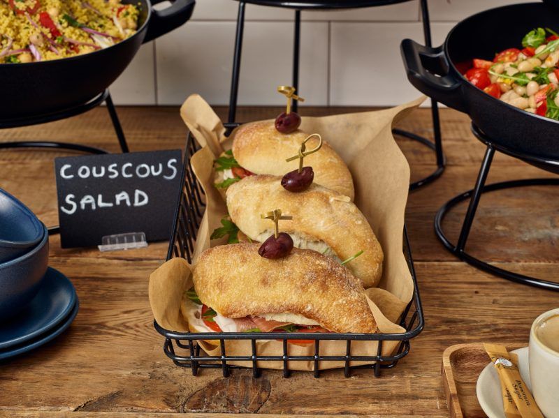 Sandwiches displayed in a Black Wire Display Basket