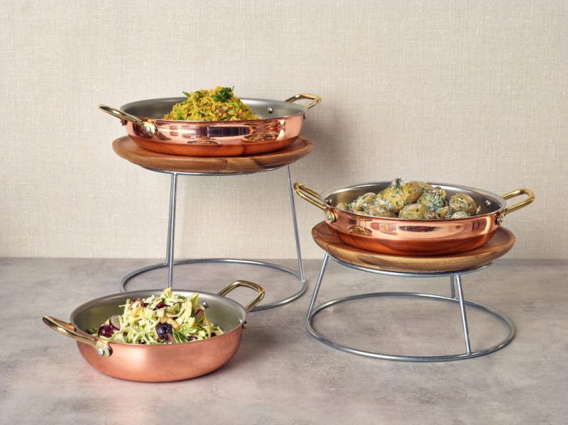 Silver buffet risers with copper plated buffet bowls