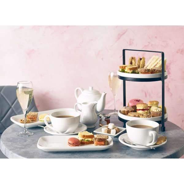Afternoon tea featuring white rounded rectangular plate