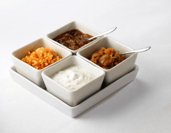 Square dish holder with 4 dishes of indian sauces etc