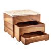 A Terrazzo Platter on top of Acacia Wood Buffet Risers