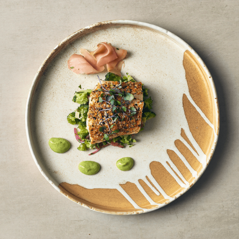 Birds eye view of food served on a 26cm Roko Sand Presentation Plate