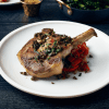 Lamb chop served on a 26cm White Porcelain Flat Rim Plate