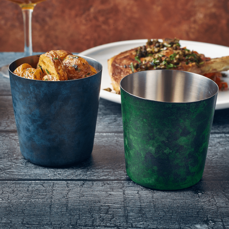 Lifestyle image of Patina Blue and Patina Green Serving Cups