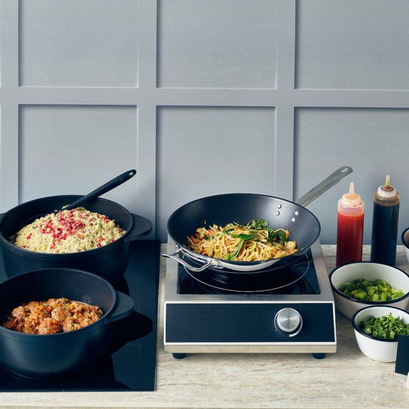 Non Stick Wok lifestyle image with other cookware