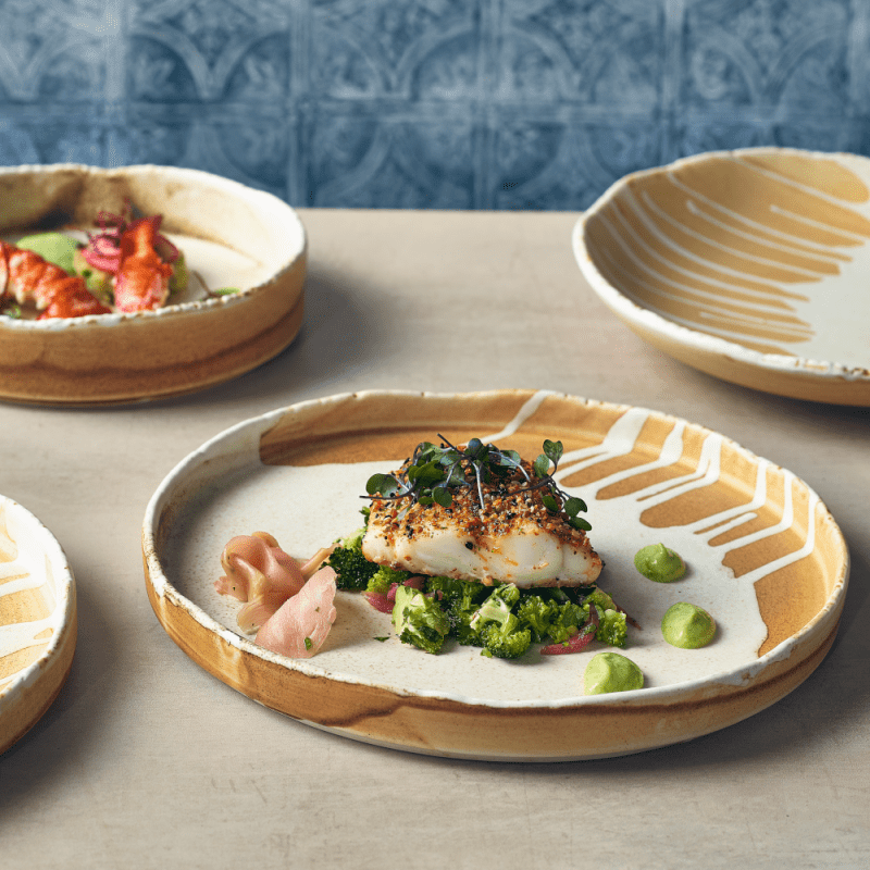 Seafood served on a 26cm Roko Sand Presentation Plate