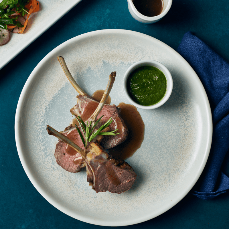 Lamb Chops and Mint sauce served on a 24cm Terra Porcelain Pearl Coupe Plate