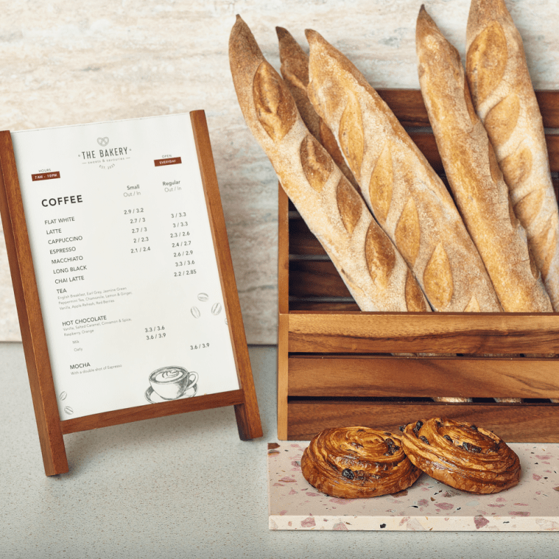 Wooden Menu Stand and Angled Acacia Wood Crate filled with bread