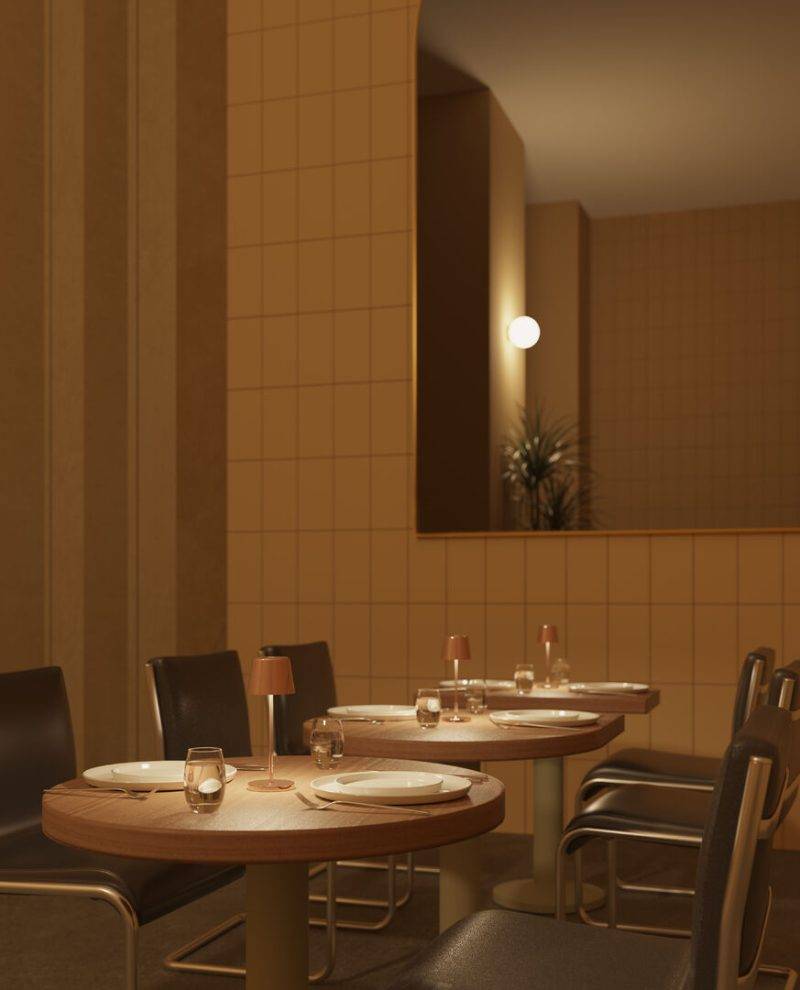 Dining tables illuminated by Bermuda Micro Copper LED Lamps
