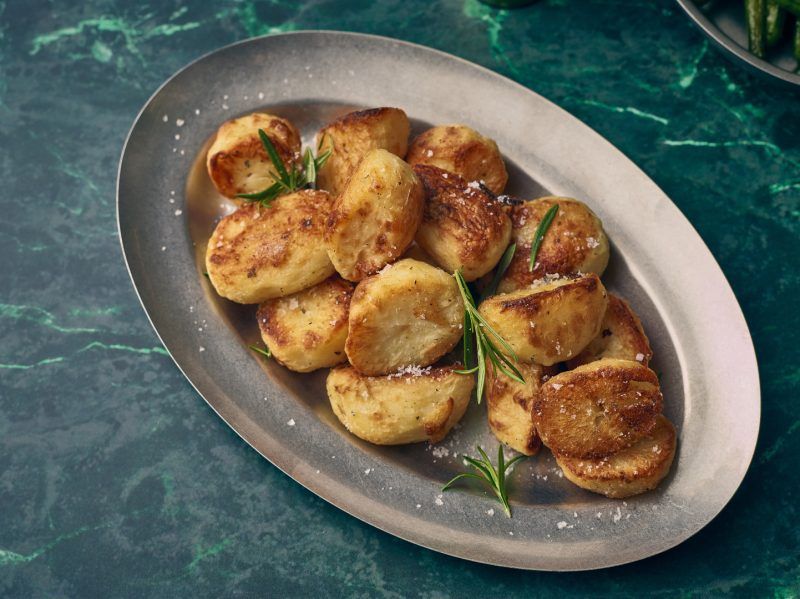 Roast potatoes served on a 30cm Vintage Steel Oval Platter