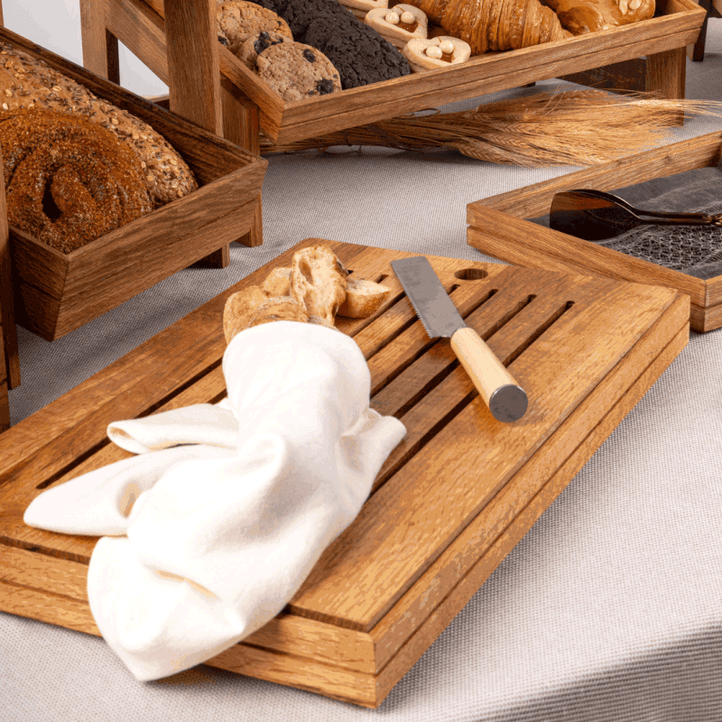 A Bread Cutting Board as part of a buffet display