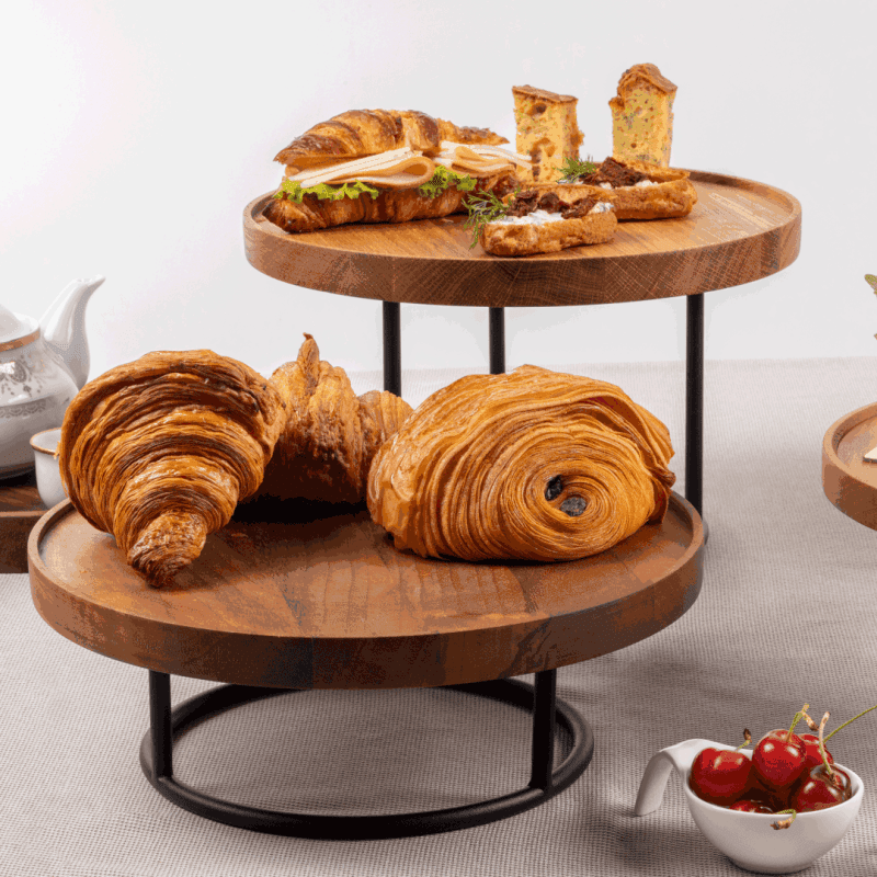 Buffet items displayed on Oak Buffet Plinths raised on metal risers