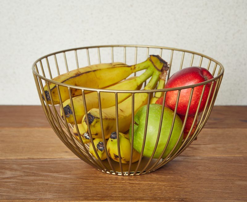 Fresh fruit served in a Round Gold Wire Basket