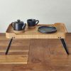 Tea served on a light wood veneer room service tray