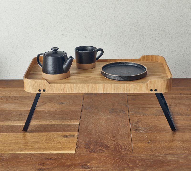 Tea served on a light wood veneer room service tray