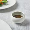 Lifestyle image of Incise Porcelain 10cl Lustre Ramekin