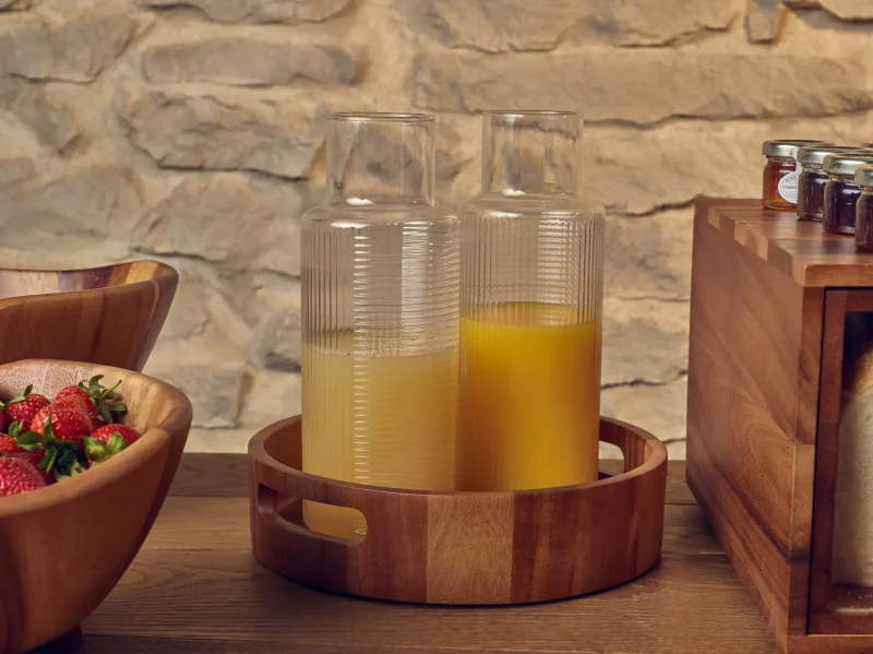 Juice served on an acacia wood serving tray