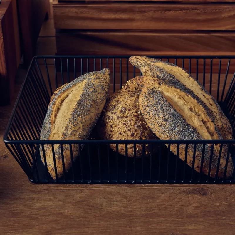 Bread displayed in a Black Wire Basket