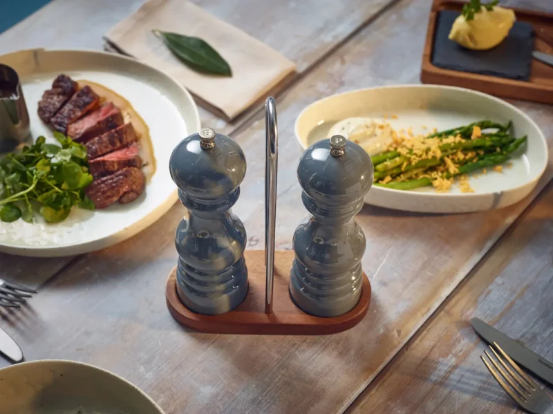 Grey Acrylic Salt and Pepper Grinders on a cruet stand